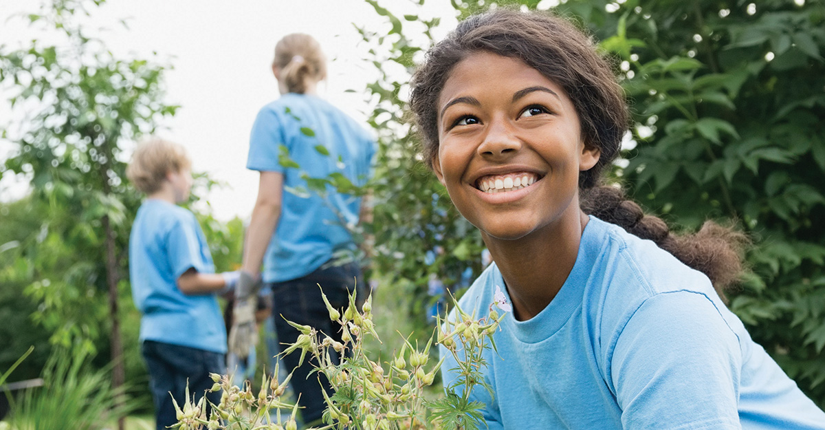 Woman smiling in a field
