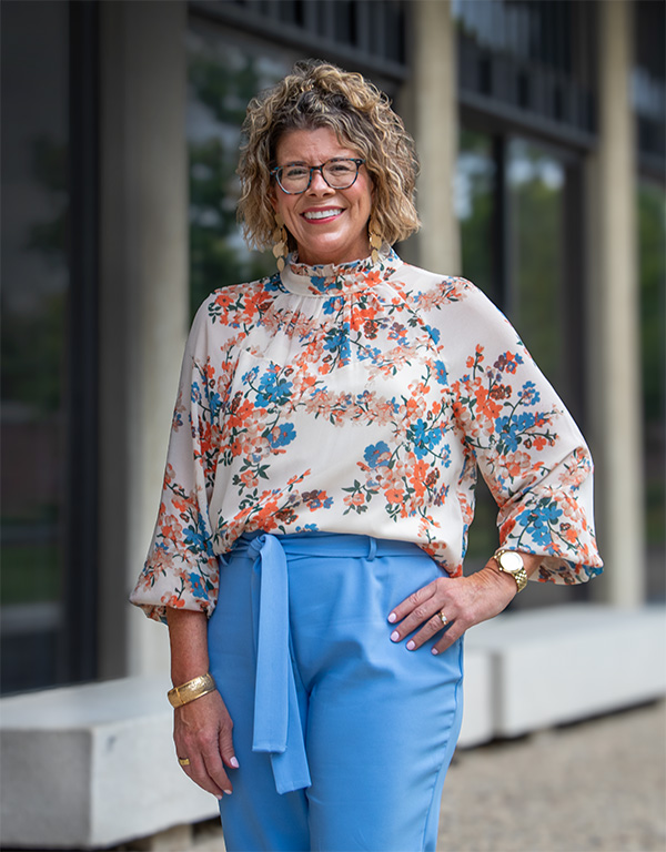 Michelle Tjelmenland, with hand on hip